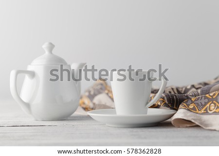 woman breakfast on table with cup of tea