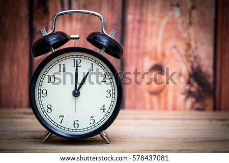 alarm clock classic design black wooden table