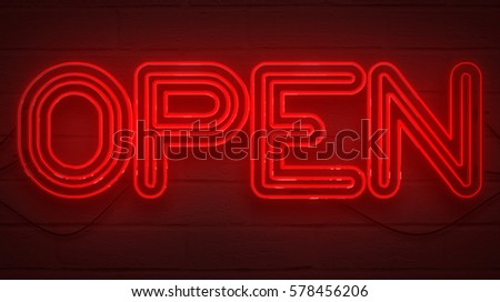flickering blinking red neon sign on brick wall background, open shop bar sign concept