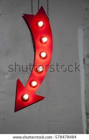 red arrow with light bulbs. signpost for your needs. Royalty-Free Stock Photo #578478484