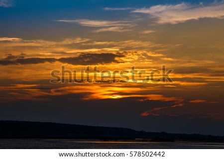 majestic colorful clouds glowing in sunlight. at sunset. beauty in the world. color in nature, unusual wonderful landscape