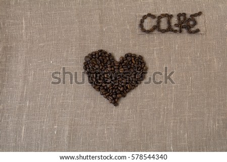 Roasted coffee beans, flax, the word coffee in French, coffee, card, in Spanish,  heart, 