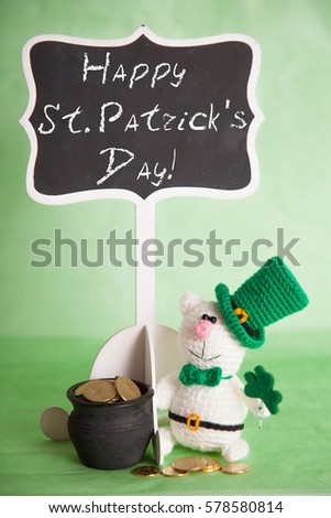 St. Patricks Day green hat shamrock white cat