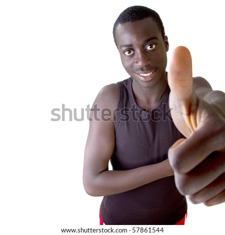 Young black teenager is  posing with a thumbs up sign. Isolated over white.