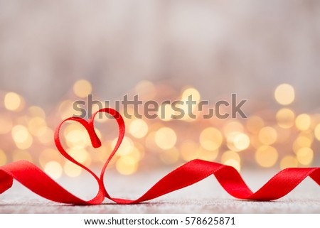 Red heart with ribbon. Valentines day background.