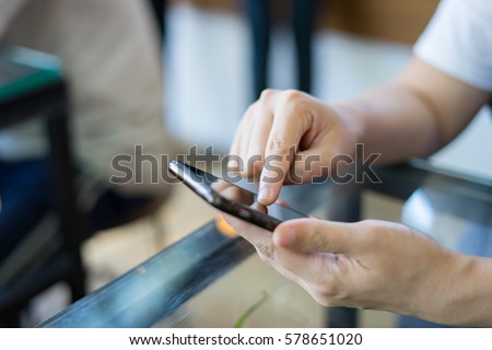 Online banking payment communication network technology internet wireless tools development mobile smartphone sync app: Business woman holding smart phone for  online or shopping payment,vintage color Royalty-Free Stock Photo #578651020
