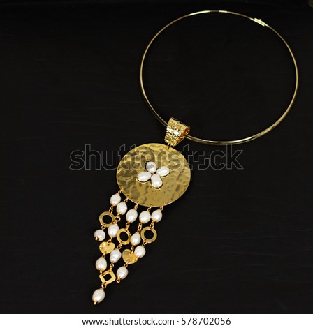 Gold handmade necklace.