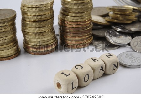A pile of coins and business conceptual with  word.
