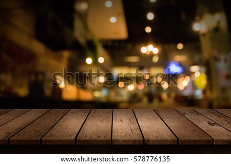 Blur coffee shop or cafe restaurant with abstract bokeh light background. For create montage product display