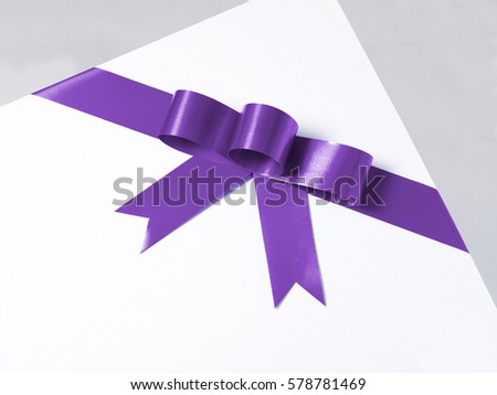 purple ribbon bow isolated on white background. Studio shot