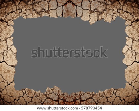 Dry ground cracked is border. Isolated on background. Clipping paths included