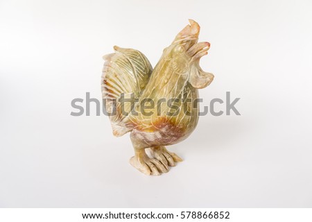 chicken sculpture, decorate,  Decorative sculpture rooster on white background . chicken sculpture isolate. Rock sculpture of cock .