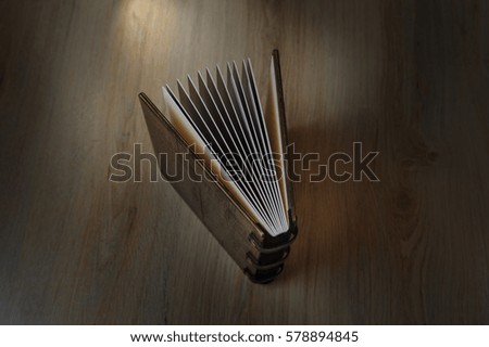 photobook on a wooden background
