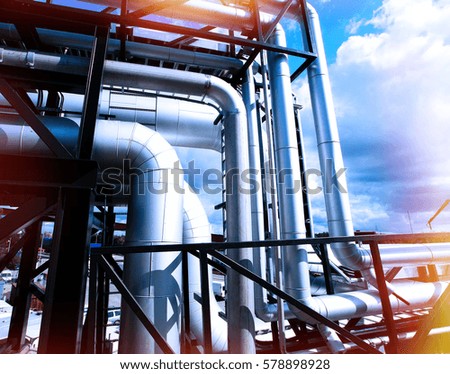 Industrial zone, Steel pipelines and equipment in blue tones