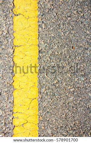 Asphalt texture with yellow line