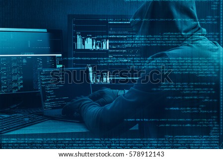 Internet crime concept. Hacker working on a code on dark digital background with digital interface around. Royalty-Free Stock Photo #578912143