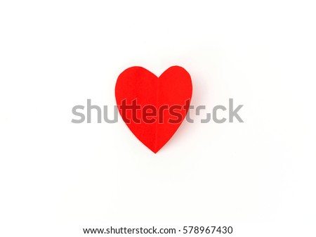 Red paper origami heart on white background