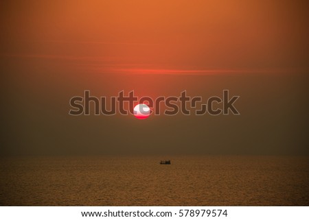 The boat sail past the Sun.