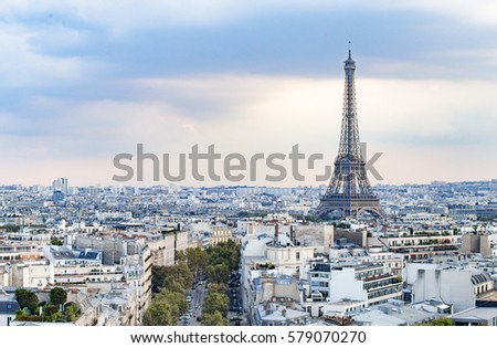 Evening Eiffel tower and Paris city view form Triumph Arc. Eiffel Tower from Champ de Mars, Paris, France. Beautiful Romantic background.