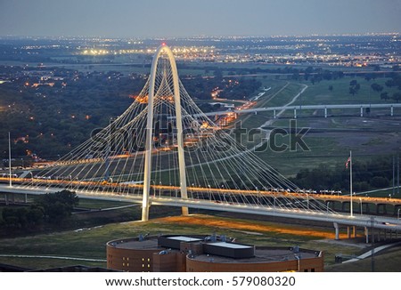 Elevated view of the 'Margaret Hunt Hill Bridge' at dusk in Texas, designed by Santiago Calatrava