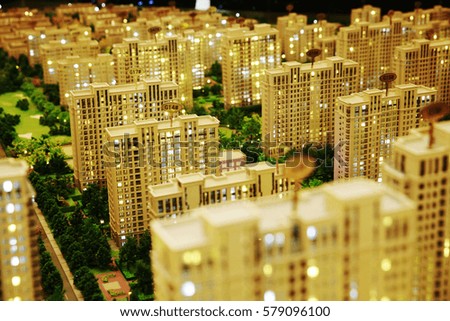 Sand table model of real estate development projects. Neat high-rise building model.