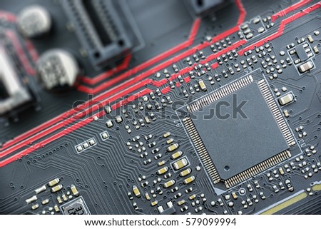 CPU on a printed circuit board. The CPU is the primary component of a computer that processes instructions. It runs the operating system and applications, constantly receiving input from users. Royalty-Free Stock Photo #579099994