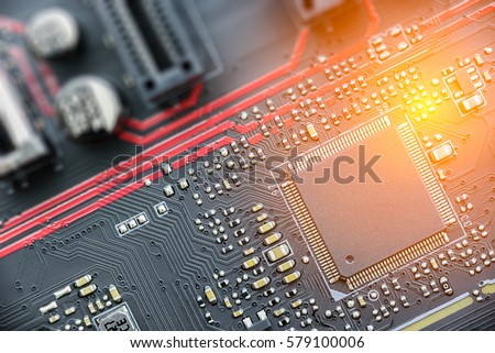CPU on a printed circuit board or PCB. The CPU is the brains and the key important part of a computer where most calculations take place. Most modern CPU are microprocessors on an integrated circuit. Royalty-Free Stock Photo #579100006