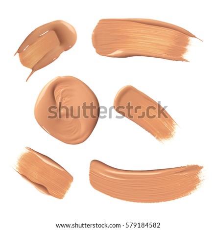 Foundation make up splodges on white Royalty-Free Stock Photo #579184582