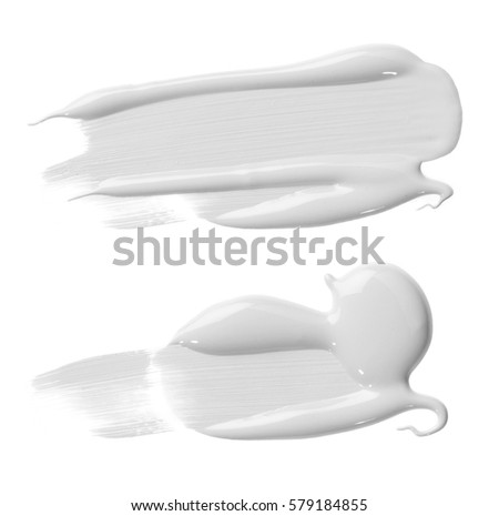 white cream splodges on white  Royalty-Free Stock Photo #579184855