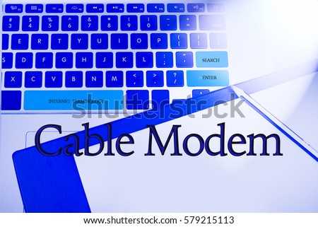 CABLE MODEM word in business concepts, technology background in laptop and notepad
