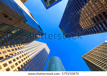 Skyward view of modern downtown skyscrapers.