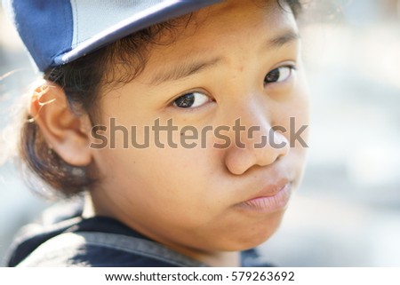 Portrait of Asian girl in cap