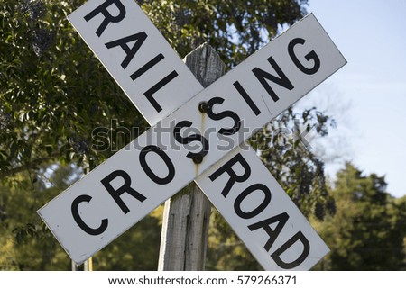 Close up of a railroad crossing sign