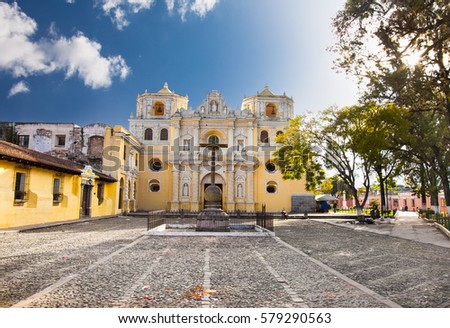  La Merced church in central park of Antigua, Guatemala. Royalty-Free Stock Photo #579290563