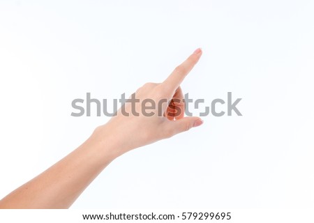 female hand outstretched to the side and pointing finger isolated on white background