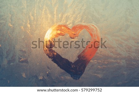 frosted heart on window