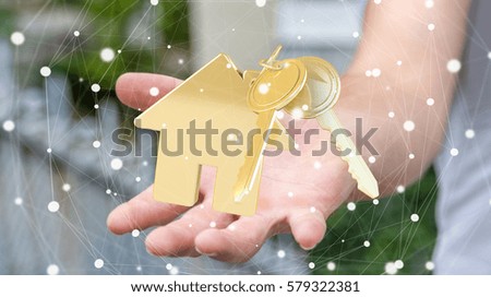 Businessman on blurred background holding key with house keyring in his hand 3D rendering