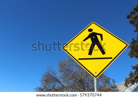 Crosswalk on a Yellow Diamond Sign