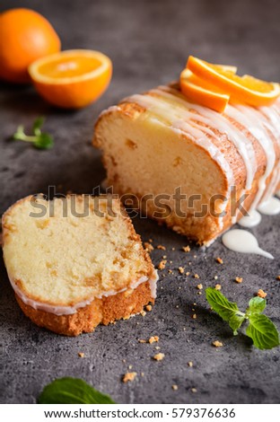 Fresh loaf of orange bread with sugar coating
