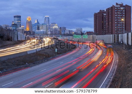 Medium Shot of Minneapolis Traffic Trails and Cityscape during Winter Blue Hour