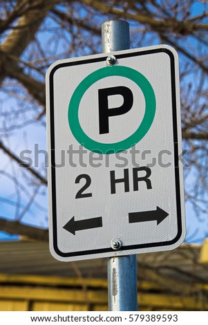 Two Hour Parking Sign with Allowable Directions