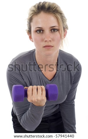 A young woman with dumbbells. Active sporty life, wellness  - isolated over a white background
