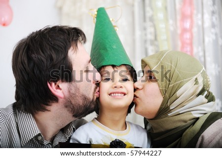 Happy birthday to you - muslim mother and father with their son