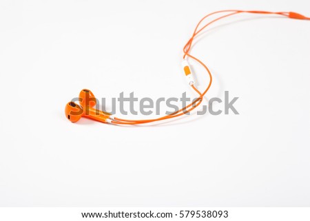 orange earphone on white background.