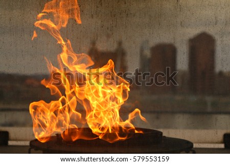 Fire pit with city background