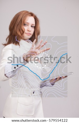 Geographic information systems concept, woman scientist working with futuristic GIS interface on a transparent screen. Royalty-Free Stock Photo #579554122