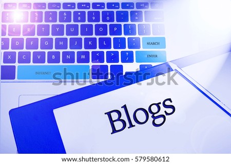 BLOG word / term  in business concepts, technology background in laptop and notepad