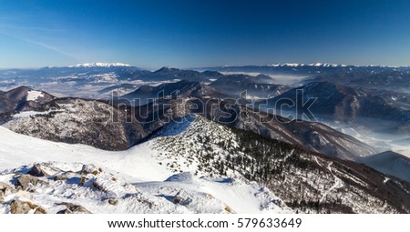 Snowy landscape view of hills from the national park Mala Fatra in Slovakia, central Europe.