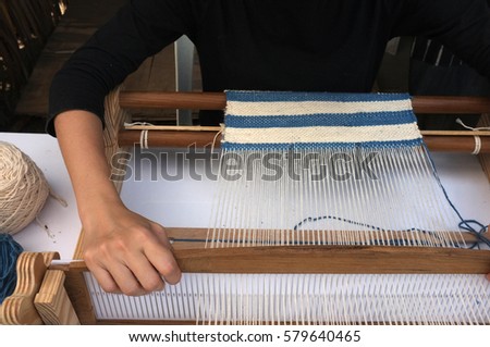 Thai textile , Workshop weaving loom , Silk cotton on the loom , concept creative , craft