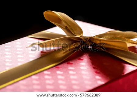 Gift box with satin ribbon